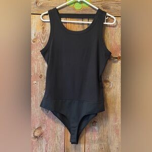 White Birch Black body Suit.  Size large. So sexy and flattering